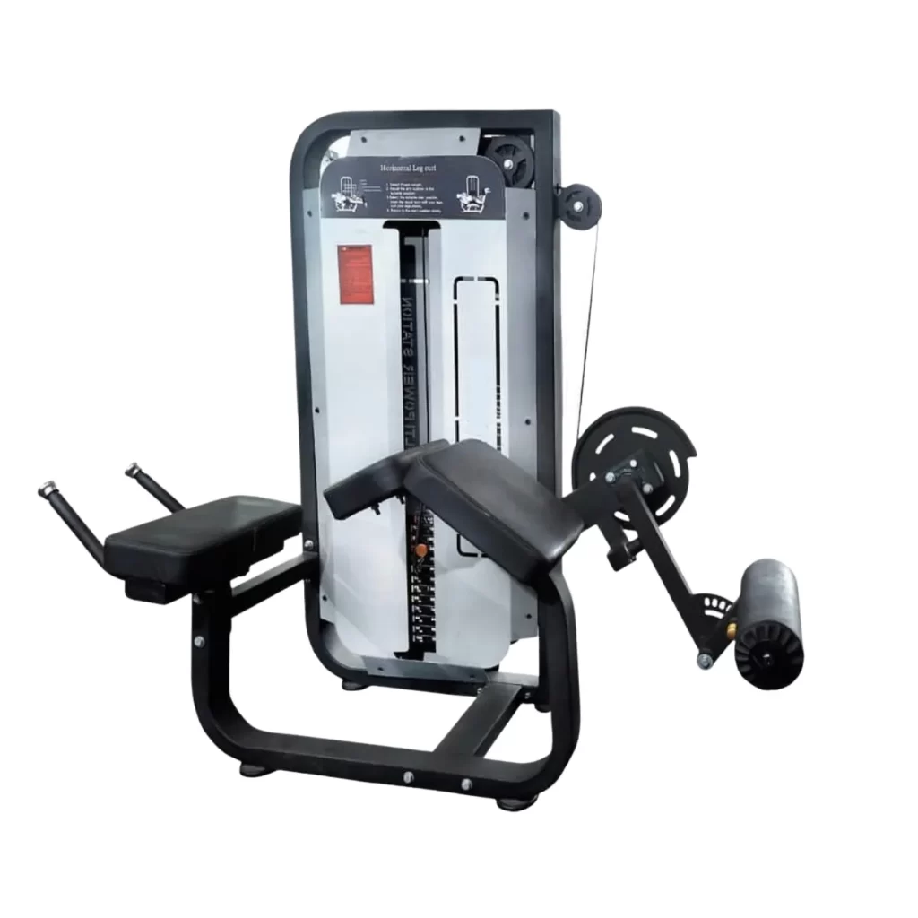 A professional gym machine allowing individuals to lie prone and perform leg curls, targeting the hamstrings effectively.