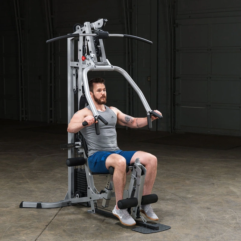 man doing chest press at muti exercise machine