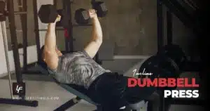 "Person performing incline dumbbell press with hex dumbbells on an adjustable bench, reaching the top of the movement. Lifefit India logo visible.