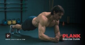 A fit man demonstrating the correct form for a forearm plank exercise in a gym to build core strength.